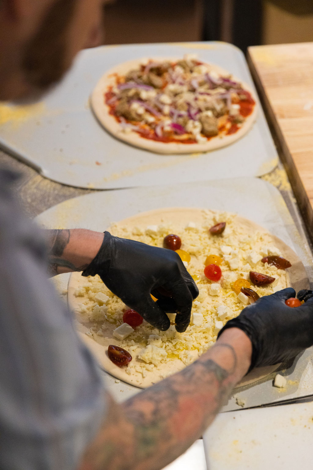gourmet pizza made with care in an open kitchen